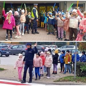 Kolaż, dzieci stojące przed szkołą mają uniesioną jedną rękę do góry i pokazują opaski odblaskowe. Poniżej przejście dla pieszych; uczniów prowadzi policjantka z uniesioną otwartą dłonią w geście stop